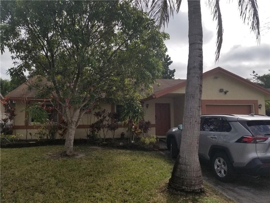Very nice property with formal living room, dining room, and family room. Large, fenced backyard with mango, avocado coconut trees... Property is in good condition. Tenant occupied on a month-to-month lease. Property will be vacant before closing. Hurricane impact windows.
