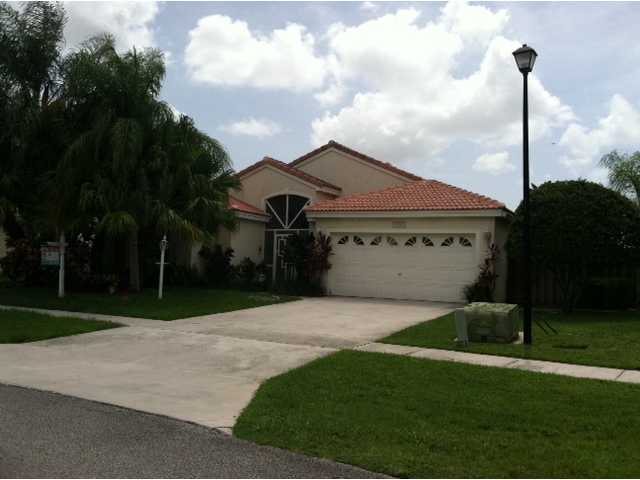 Expansive and serene Lake view! Open Floor plan with upgraded kitchen. Vaulted ceilings. Tile and wood floors..No carpets here! Split bedroom plan. Huge screened in patio overlooking lake. Quiet and well located neighborhood.Olympic size community pool with separate baby pool, racquet ball, basketball, tennis. Close to shopping. Great schools!
