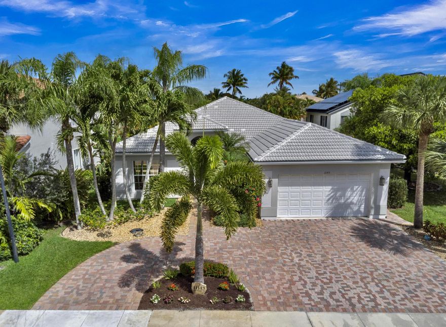 Beautiful 5 bed 3bath waterfront home located on an oversized cul de sac lot in the desirable gated community of Isles of Wellington. Nestled in the center of the world renowned Wellington equestrian community, this property offers both privacy & convenience. The home features a recently updated open flowing floor plan with engineered wood flooring throughout the main living areas & a stylish kitchen with a custom farmhouse barn sink. Enjoy exceptional outdoor living with a travertine pool deck, heated & chilled pool for year round comfort, peaceful water views & a custom tiki bar entertainment area ideal for gatherings. The oversized lot provides additional space & privacy in a quiet cul de sac setting. Isles of Wellington offers gated access & fine community amenities.