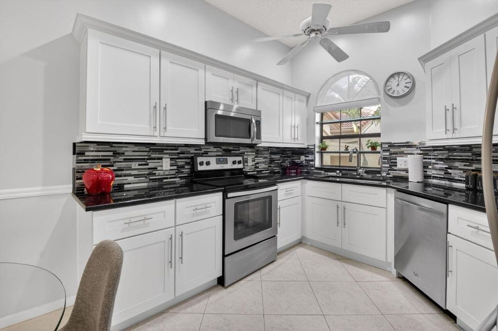 Photo of 5195 Europa Drive #L, Boynton Beach, FL 33437 (MLS # R11158811)