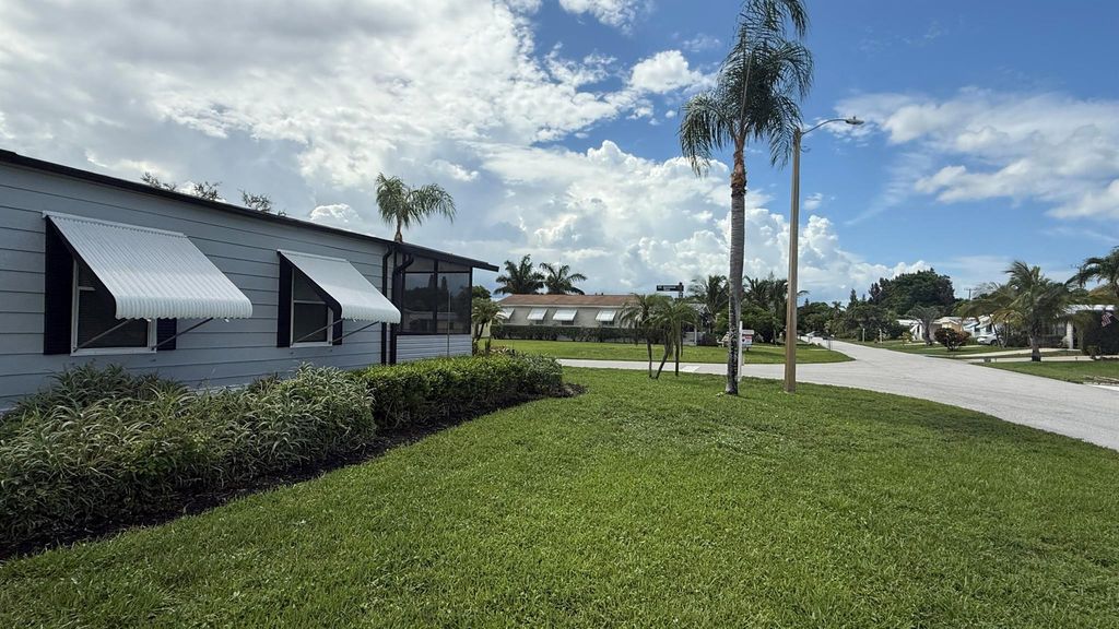 Photo of 7056 SE Amendment Street, Hobe Sound, FL 33455 (MLS # R11107383)