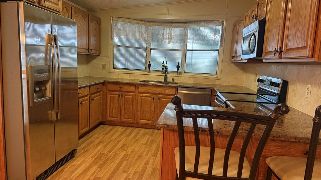 Photo of 7056 SE Amendment Street, Hobe Sound, FL 33455 (MLS # R11107383)