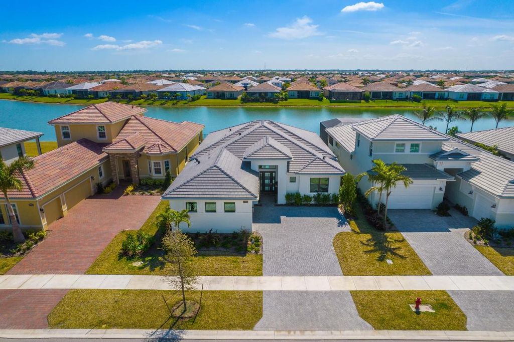 Photo of 8621 SW Felicita Way, Port Saint Lucie, FL 34987 (MLS # R10969358)