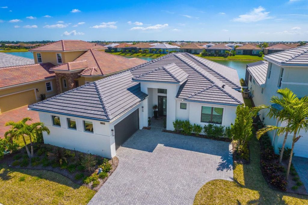 Photo of 8621 SW Felicita Way, Port Saint Lucie, FL 34987 (MLS # R10969358)