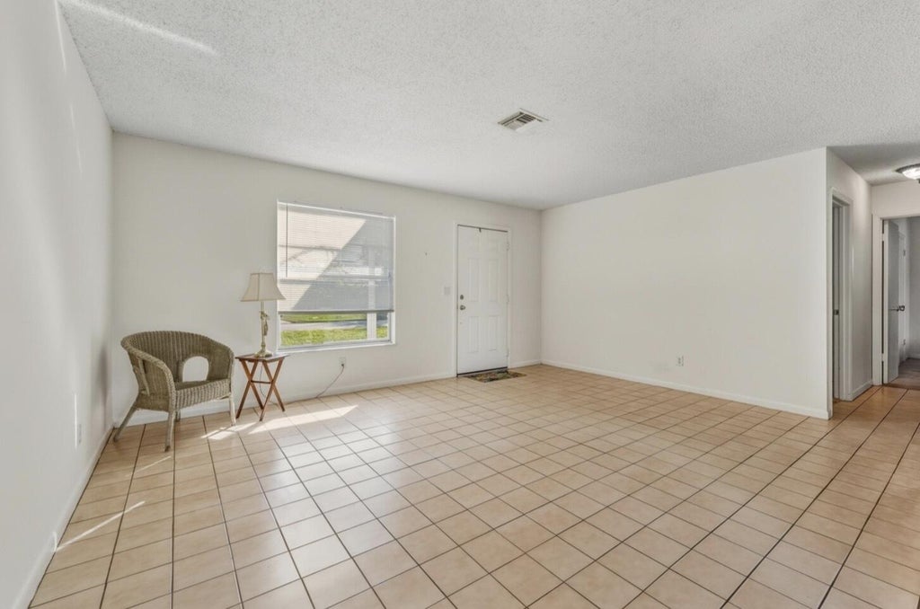 Photo of 307 SE HUSTED Terrace, Port Saint Lucie, FL 34983 (MLS # B26080883)