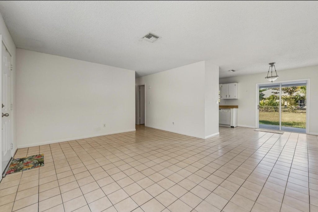 Photo of 307 SE HUSTED Terrace, Port Saint Lucie, FL 34983 (MLS # B26080883)