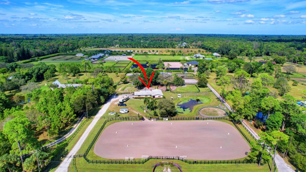 Photo of 15349 Collecting Canal Road, Loxahatchee Groves, FL 33470 (MLS # R10930122)