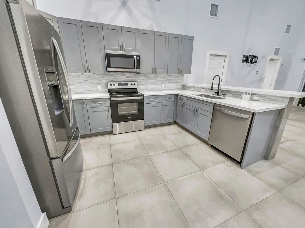 Photo of 1543 SW 32nd Street, Fort Lauderdale, FL 33315 (MLS # R11152511)