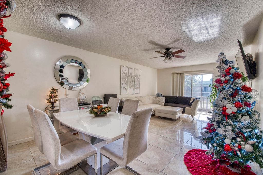 Photo of 4125 NW 88th Avenue #202, Coral Springs, FL 33065 (MLS # B26026617)