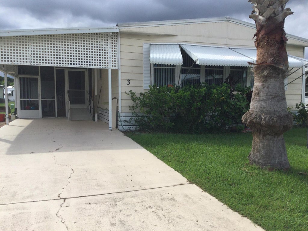 Photo of 3 SE Jasmine Lane, Port Saint Lucie, FL 34952 (MLS # B26080143)
