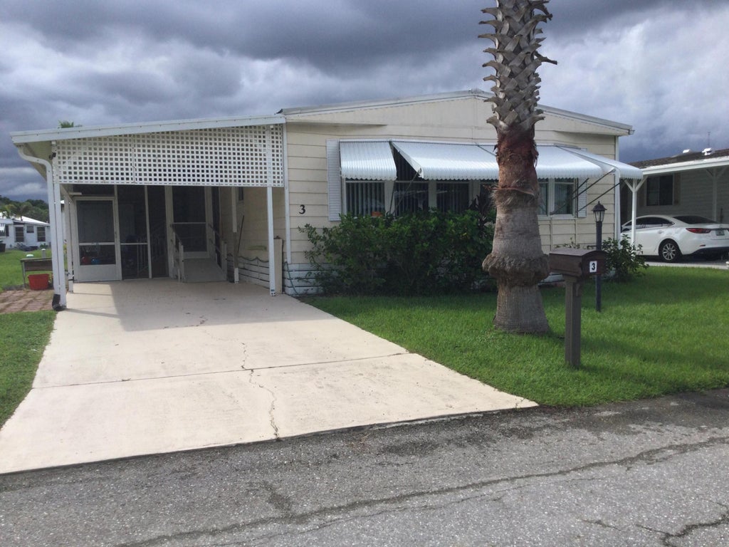 Photo of 3 SE Jasmine Lane, Port Saint Lucie, FL 34952 (MLS # B26080143)