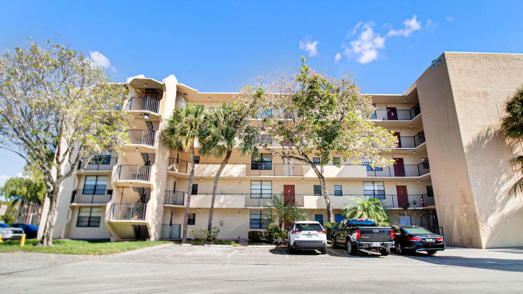 Photo of 3450 Blue Lake Drive #305, Pompano Beach, FL 33064 (MLS # B26005504)