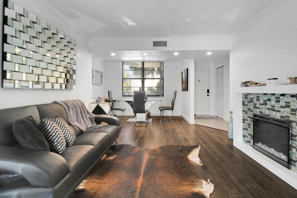 Photo of 3450 Blue Lake Drive #305, Pompano Beach, FL 33064 (MLS # B26005504)