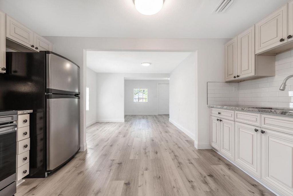 Photo of 4398 Whispering Pines Road, West Palm Beach, FL 33406 (MLS # R10979930)