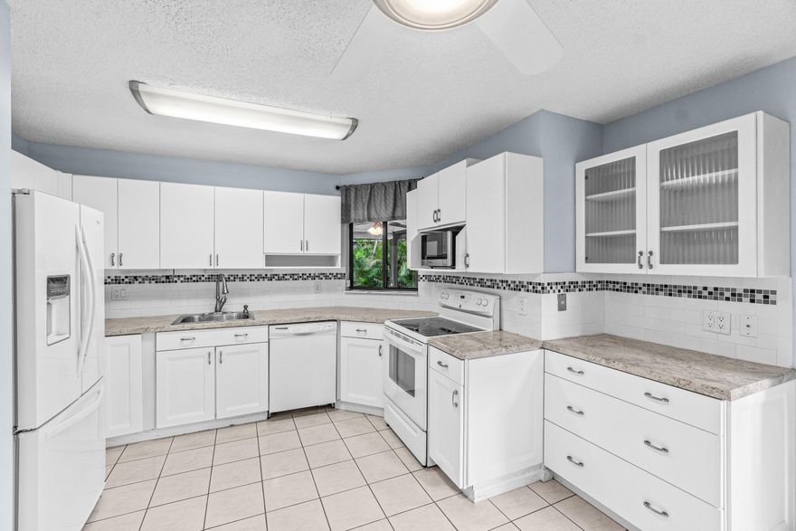New 2024 roof, priced with room to make it your own. Welcome to 10173 Chestwood Rd, a rarely available 3-bedroom, 2-bath home in the gated 55+ community of Banyan Springs in Boynton Beach. With a brand-new 2024 roof, a 2016 AC, and tile and vinyl flooring throughout, the big-ticket items are already handled. The layout is bright and open, offering great flow for everyday living and entertaining. The home is clean and well cared for, with cosmetic updates presenting a clear opportunity to personalize and add value.
Banyan Springs offers a full resort-style lifestyle with a cafe, fitness center, tennis and pickleball courts, pool, salon, and active social spaces including billiards and bocce. Conveniently located near shopping, dining, and South Florida beaches. Now priced at $270,000 this is one of the best values for a 3-bedroom home in the community. Schedule your showing today while availability remains limited.