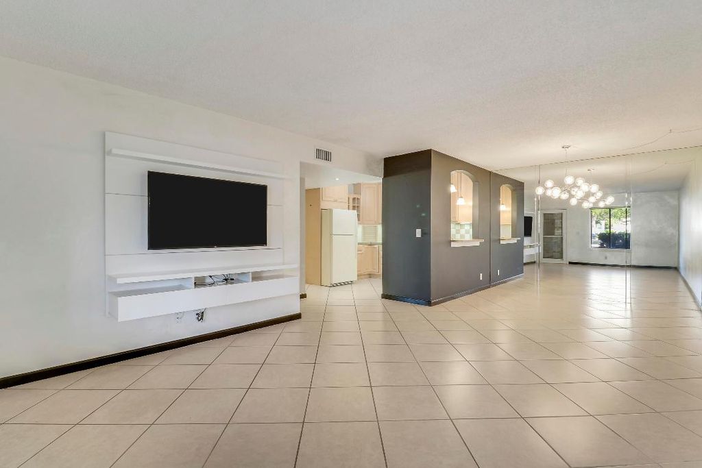 Photo of 6370 Chasewood Drive #A-3, Jupiter, FL 33458 (MLS # R11153720)