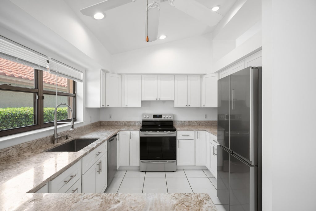 Photo of 2735 SW Mariposa Circle, Palm City, FL 34990 (MLS # B26033696)