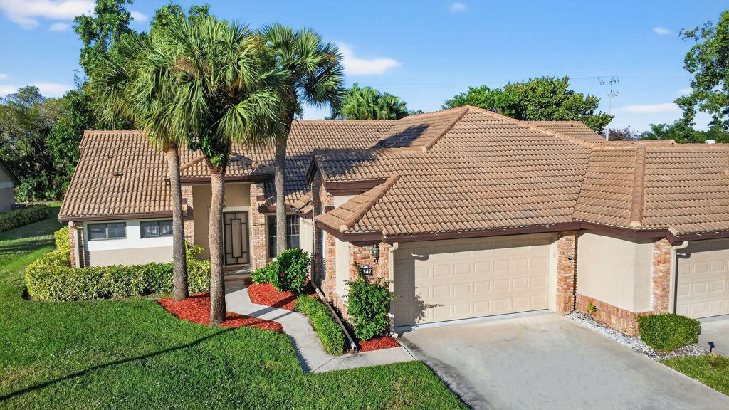 Photo of 7147 Le Chalet Boulevard, Boynton Beach, FL 33472 (MLS # R11145754)