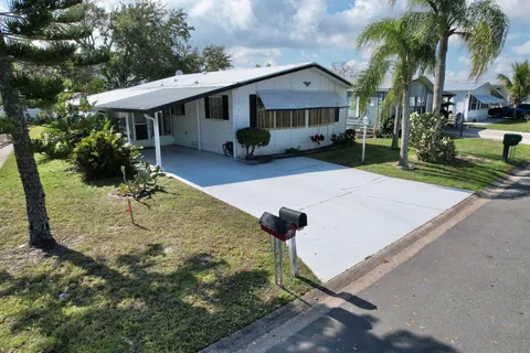 727 Hyacinth Circle, Barefoot Bay, FL MLS: R11061581