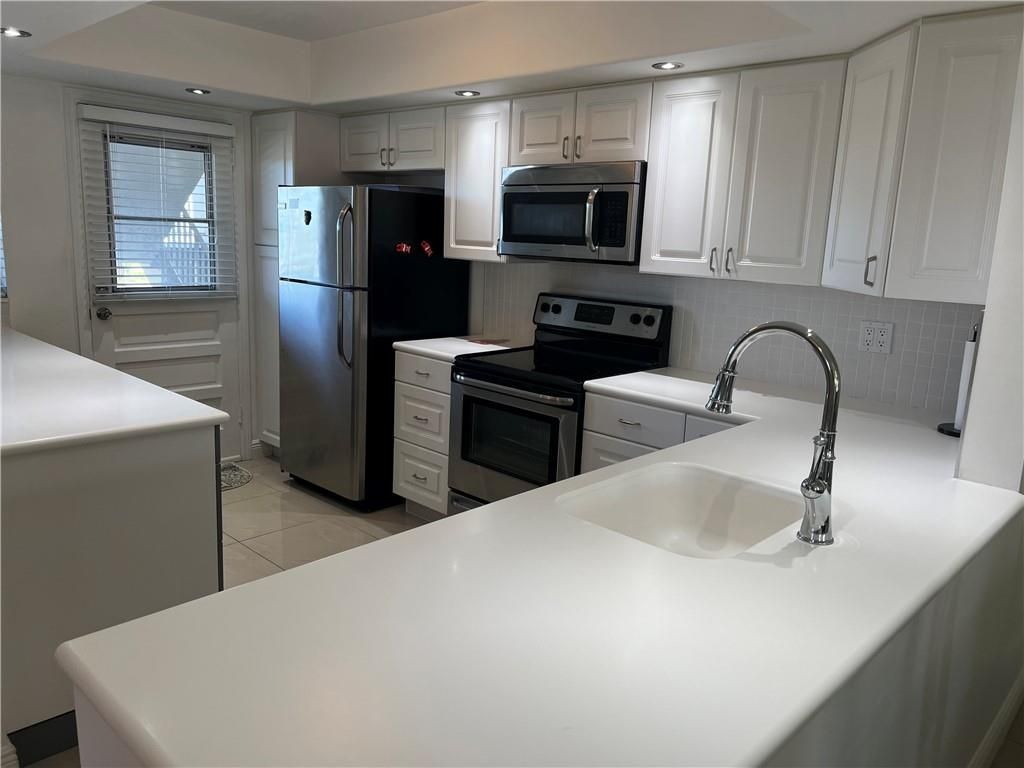 Photo of 3091 NW 46th Ave #310A, Lauderdale Lakes, FL 33313 (MLS # F10361231)