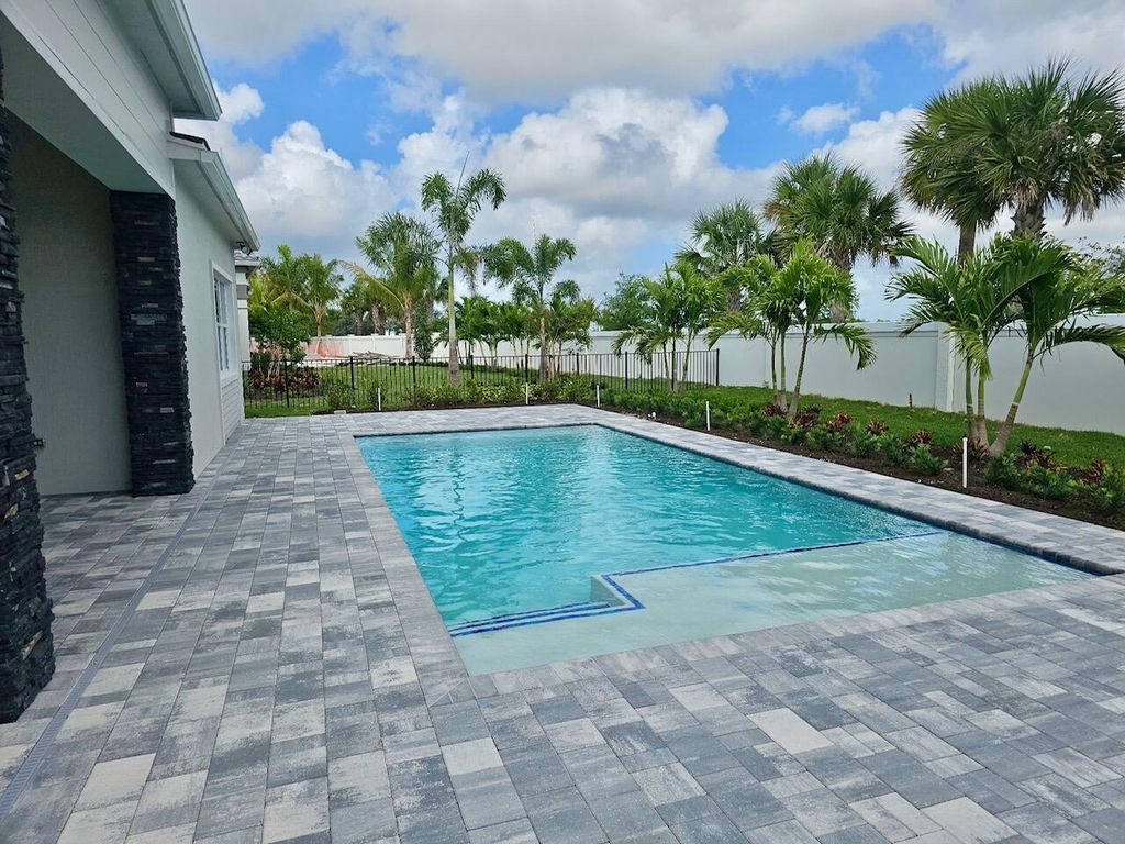 Photo of 10706 Stellar Circle #Stellar, Palm Beach Gardens, FL 33412 (MLS # R11027728)