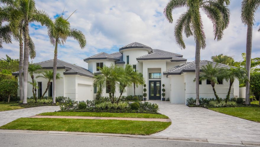 Clean, sleek interior showcase window walls of glass overlooking panoramic lake and golf course views in this impressive 6 bedroom, 7.2 bath estate.  Totally renovated in 2018 with elegant entertaining spaces feature a stunning living room with custom fireplace, bar and dramatic staircase, formal dining room, gourmet kitchen and expansive family room.  Quality and attention to detail is evident with top of the line appliances and fittings throughout.  A grand master suite offers a private sitting room, luxurious marble his and her baths and generous wardrobes.  An office and two additional en suite bedrooms complete the first floor.  Upstairs feature three en suite bedrooms, loft area and beautiful balcony overlooking spectacular views.  The expansive outdoor entertainment area offers a summer kitchen and resort style pool with spillover fountain and spa.  Other amenities include impact resistant windows and doors, full house generator.  The information herein is deemed reliable and subject to errors, omissions and changes without notice.  All measurements are approximate.