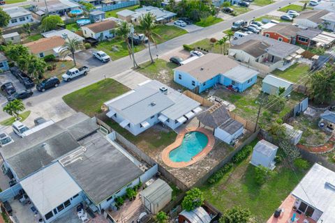 Tiny photo for 3110 Scanlan Avenue, Lake Worth, FL 33461 (MLS # B26010230)