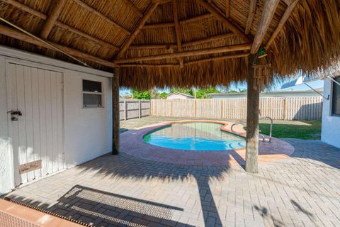 Tiny photo for 3110 Scanlan Avenue, Lake Worth, FL 33461 (MLS # B26010230)