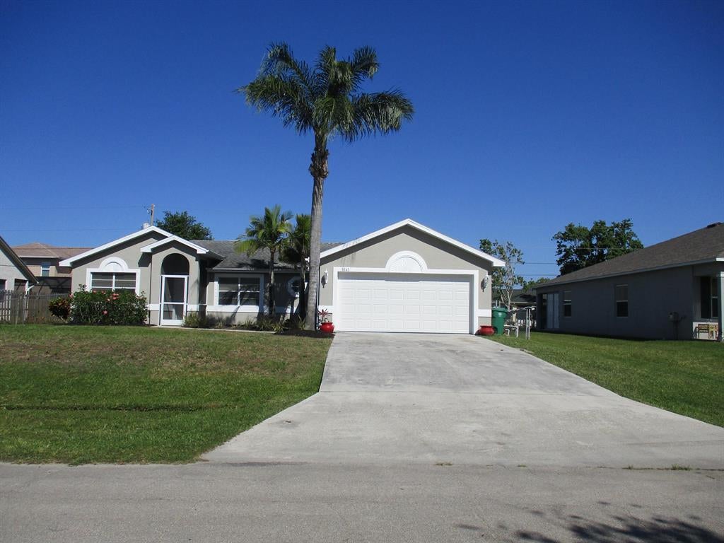 Photo of 1641 SW Realty Street, Port Saint Lucie, FL 34987 (MLS # R10787689)