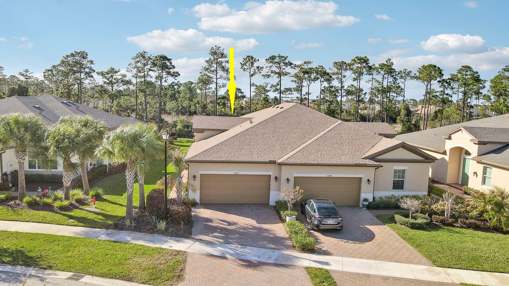 Photo of 10894 SW Winding Lakes Cir, Port Saint Lucie, FL 34987 (MLS # B26001160)