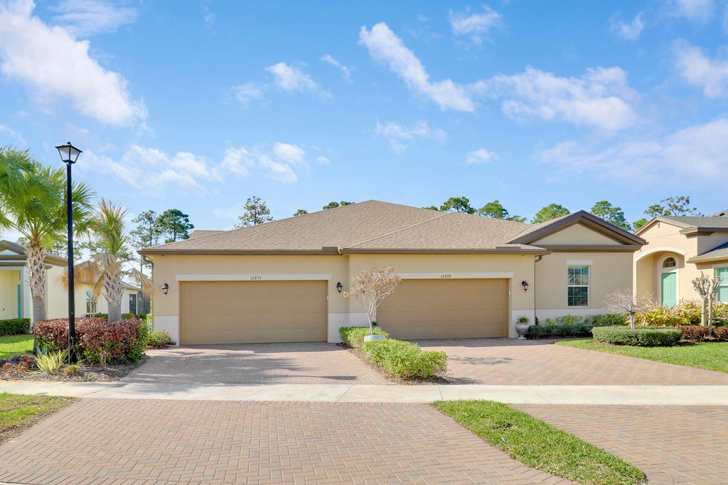Photo of 10894 SW Winding Lakes Cir, Port Saint Lucie, FL 34987 (MLS # B26001160)