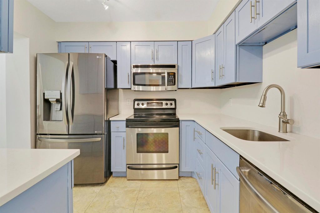 Photo of 118 Castlewood Drive #129, North Palm Beach, FL 33408 (MLS # R10946687)