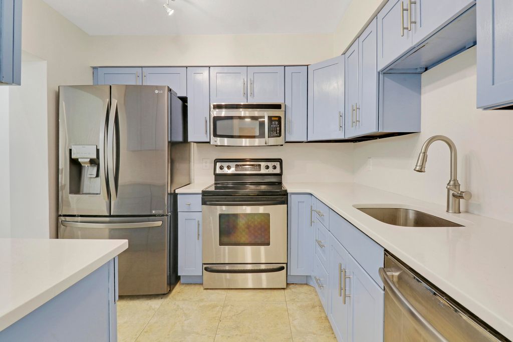 Photo of 118 Castlewood Drive #129, North Palm Beach, FL 33408 (MLS # R10946687)