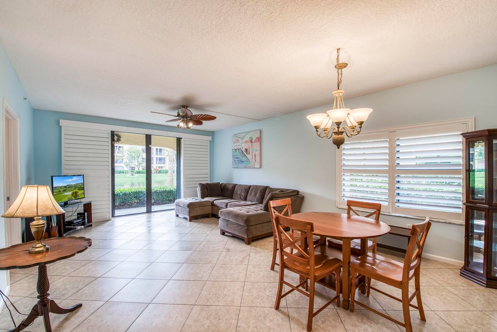 Photo of 800 Uno Lago Drive #105, Juno Beach, FL 33408 (MLS # R11140558)