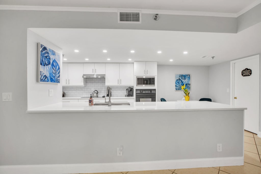 Photo of 955 Egret Circle #104, Delray Beach, FL 33444 (MLS # B26059040)