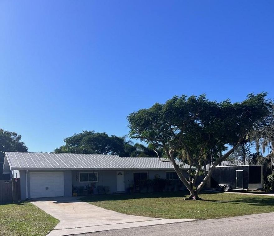 *Professional Pictures Coming Soon*
Welcome home to this Palm City gem!  This 3/2 CBS home features a double lot, durable metal roof, split bedrooms, and an inviting screened patio overlooking the fenced backyard and sparkling pool.  With 2 driveways and room for your boat or RV, this home is ideal for active Florida living.  Set in desirable Palm City location with top-rated schools, easy access to parks and a nearby boat ramp only 4 blocks away, and walking distance to Patio Park, you'll love the convenience and lifestyle this home offers.  Whether you're entertaining poolside or heading out on the water, this home is ready to fit your life.