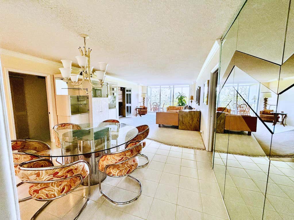 Photo of 3930 OAKS CLUBHOUSE Drive #506, Pompano Beach, FL 33069 (MLS # B26067095)