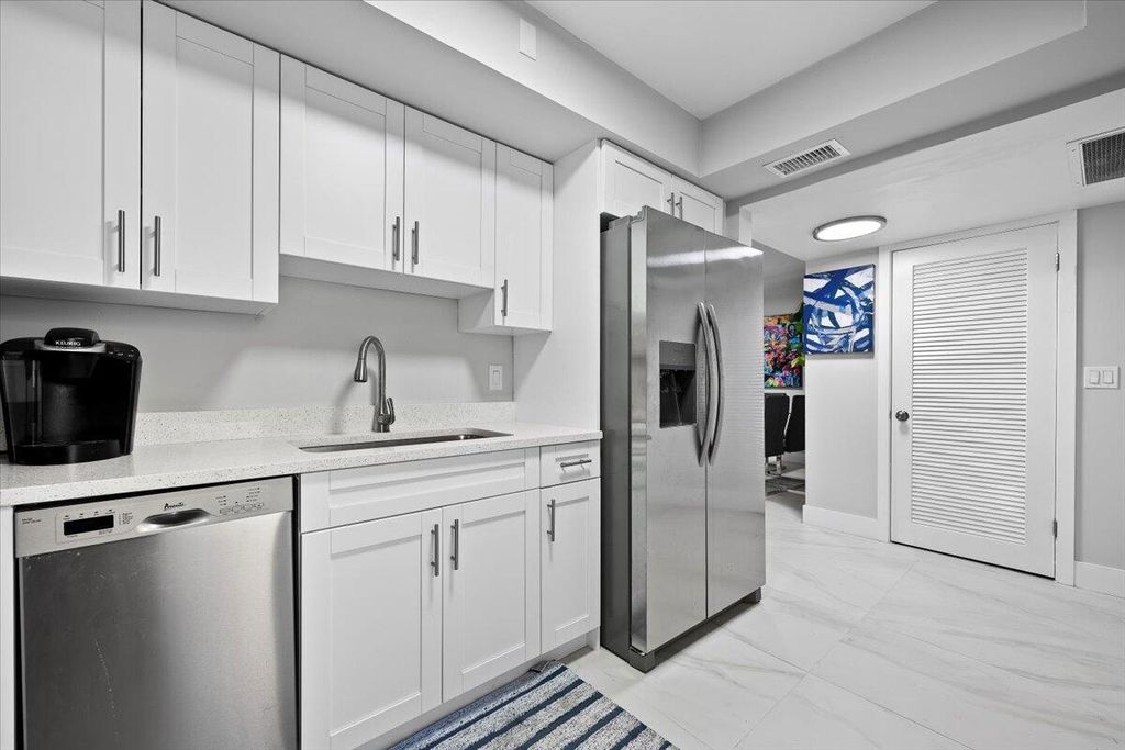 Photo of 5500 Tamberlane Circle #105, Palm Beach Gardens, FL 33418 (MLS # R11140876)