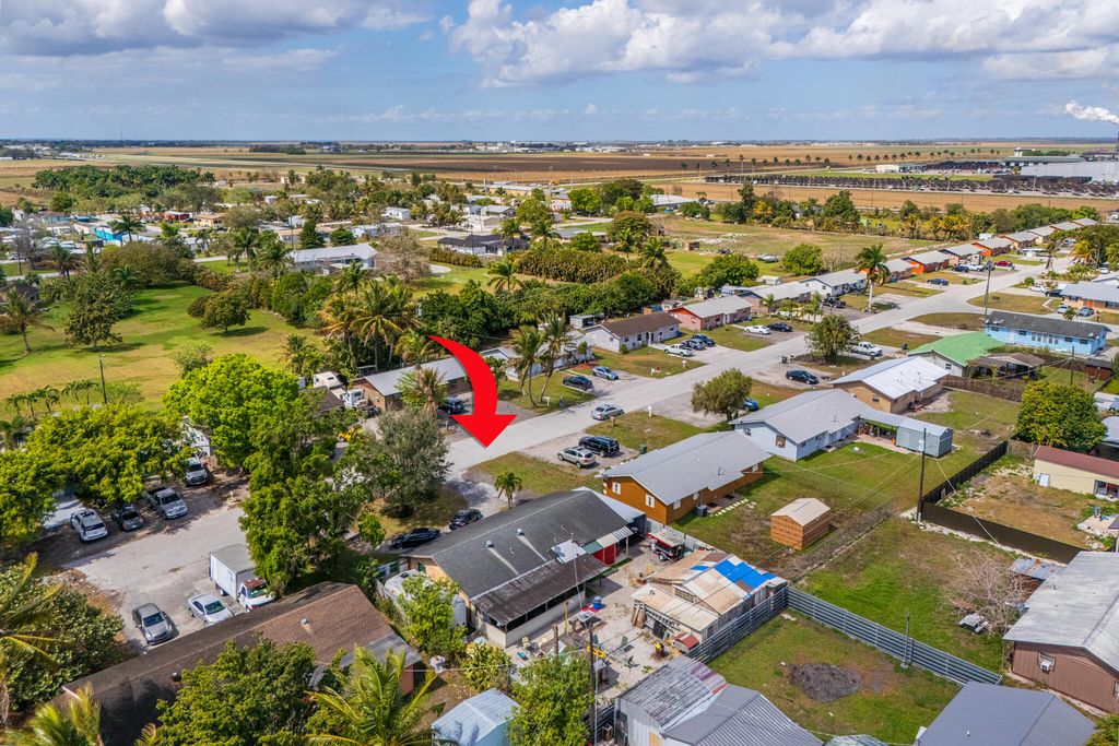 Photo of 817 NE 20th St, Belle Glade, FL 33430 (MLS # B26001013)