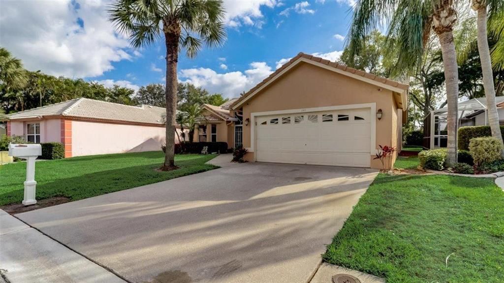 Photo of 141 Cove Road Rd, Green Acres, FL 33413 (MLS # R10698988)