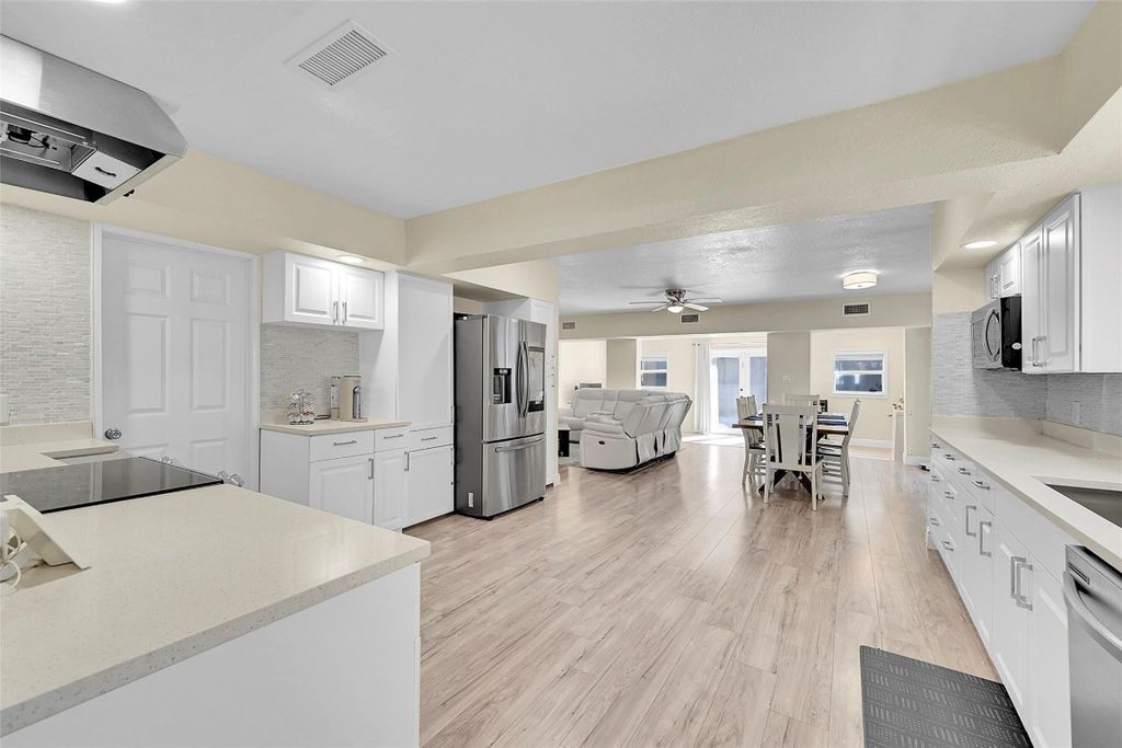 Photo of 5940 NW 41st Terrace, North Lauderdale, FL 33319 (MLS # F10537643)