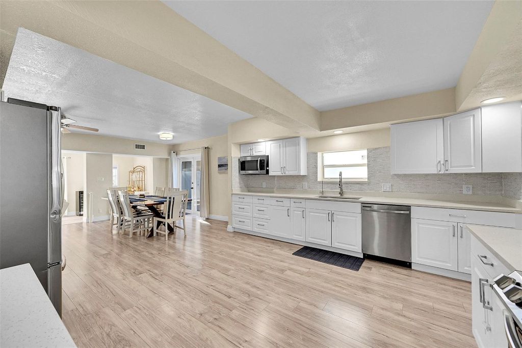 Photo of 5940 NW 41st Terrace, North Lauderdale, FL 33319 (MLS # F10537643)