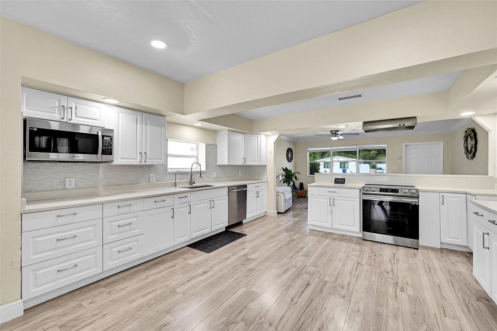 Photo of 5940 NW 41st Terrace, North Lauderdale, FL 33319 (MLS # F10537643)