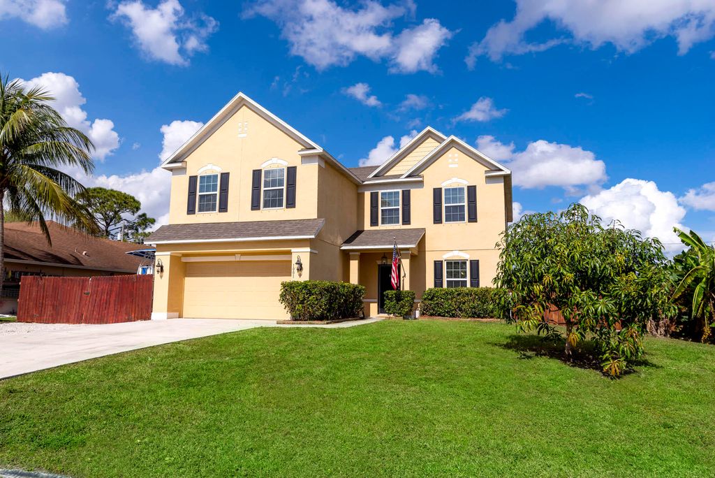 Photo of 1001 SW Charcoal Avenue, Port Saint Lucie, FL 34953 (MLS # R10863095)