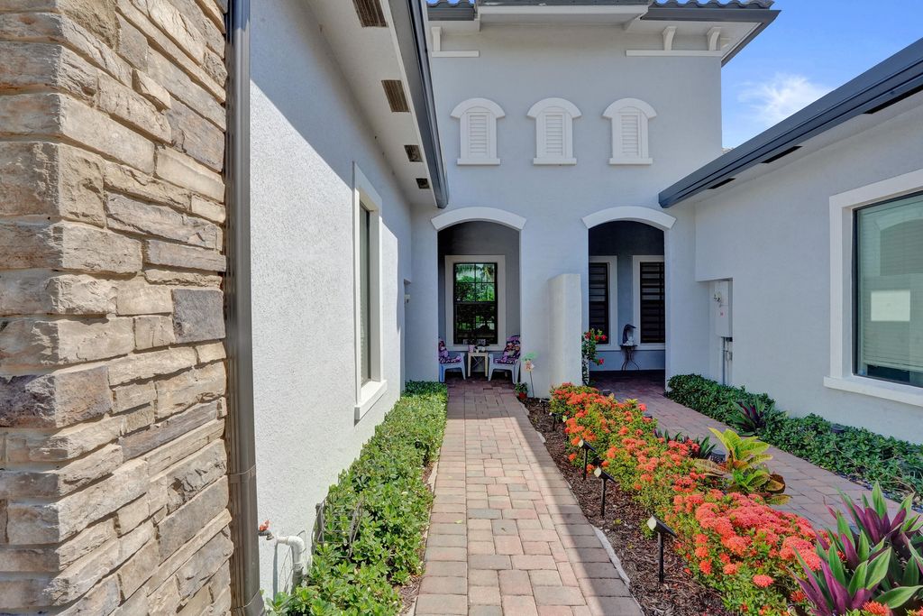 Photo of 7719 S Blue Spring Drive, Parkland, FL 33067 (MLS # B26046853)
