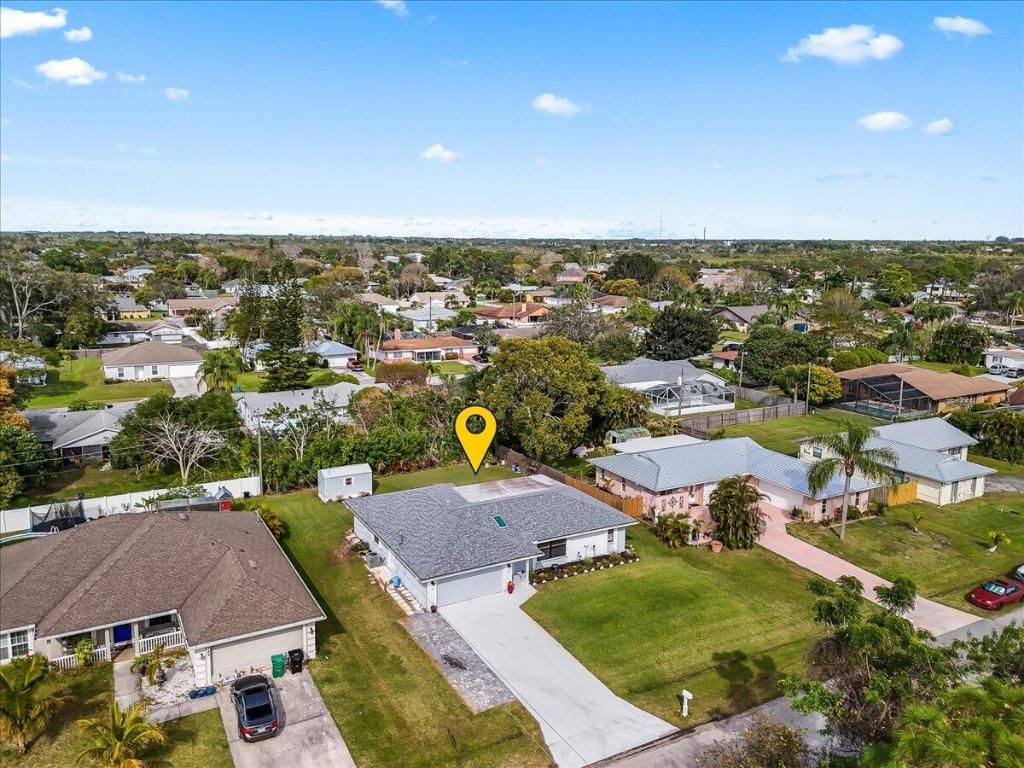 Photo of 761 SE Cavern Avenue, Port Saint Lucie, FL 34983 (MLS # R11055029)