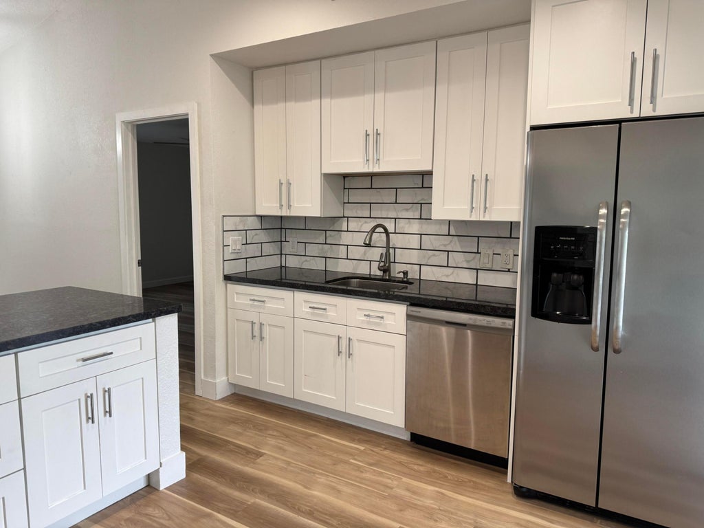Photo of 3562 SW Rivera Street, Port Saint Lucie, FL 34953 (MLS # R11105088)