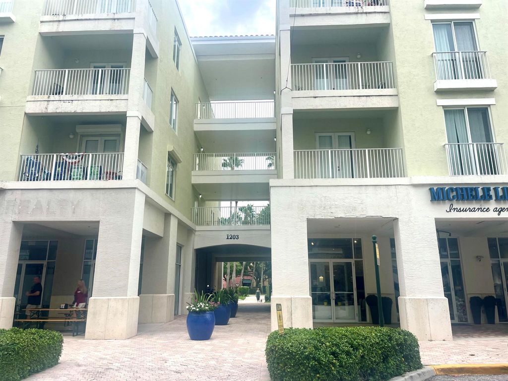 Photo of 1203 Town Center Drive #209, Jupiter, FL 33458 (MLS # R11111454)