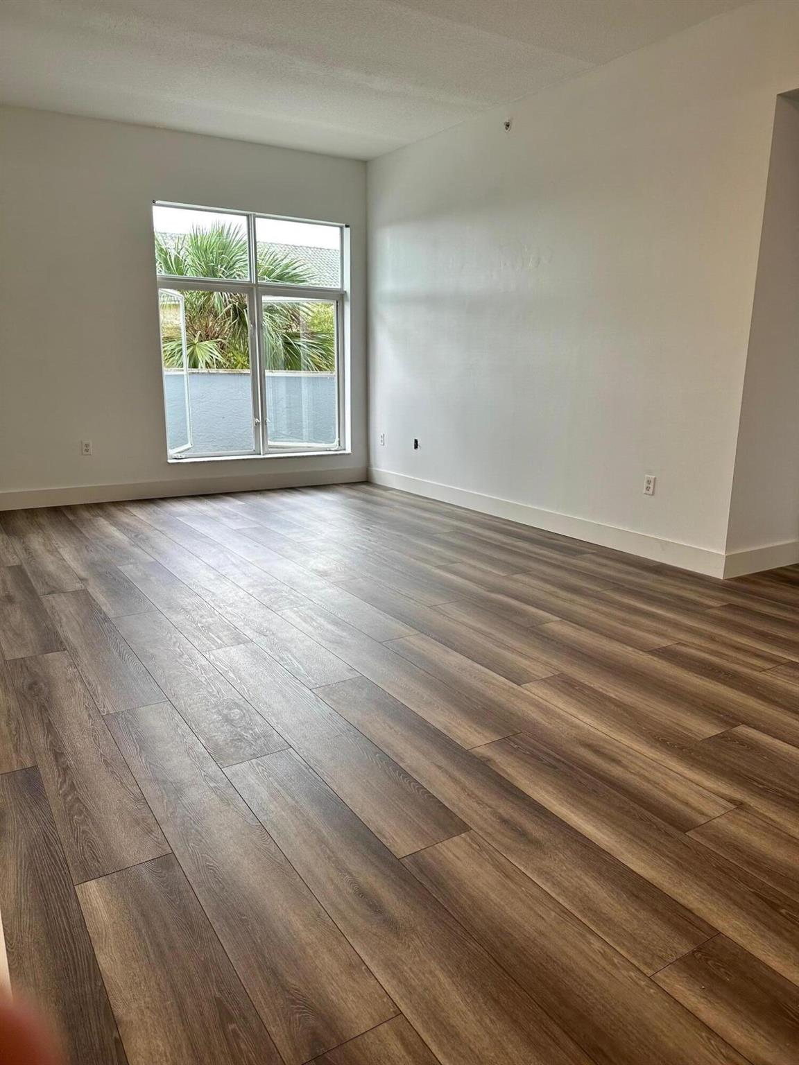 Great location in downtown Abacoa overlooking the stadium with two walkout balconies. Professionally painted, clean and spacious split floor plan with new AC and dishwasher. Walking distance to all the shops and restaurants at Abacoa Town Center, Roger Dean Stadium, Florida Atlantic University, and the Scripps institute. Abacoa is a resort-style, active community, with a community golf course and clubhouse, located within minutes of stunning beaches. Available July 15. First, last and security at signing. HOA application $150 fee. If you have pets the HOA will require a $200 fee to process the pet. The owner will also require a $300 non-refundable pet deposit fee. Tenant is responsible for water and power bill. Direct TV Basic and the Internet are included.