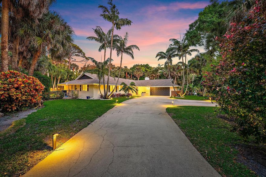 Welcome to your own private and peaceful oasis in the exclusive High Sierra community of West Palm Beach. With only 30 homes, a low HOA, and a secure electronic gated entrance, this residence offers both privacy and tranquility. This home has been almost completely remodeled over the last 2 years and has impact glass and doors throughout. Nestled on an oversized half-acre lot with lush landscaping, this four-bedroom, two-and-a-half-bathroom home spans 2,335 square feet under air and features a stunning screened-in pool and wrap-around covered lanai. Upon entering, a welcoming foyer leads to the formal living room, where an electric fireplace, shiplap accents, and a floating shelf create a cozy ambiance.